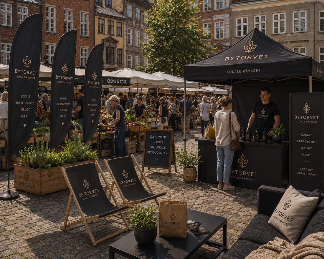 Telt med tryk, flag og siddepladser til events i et markedsmiljø