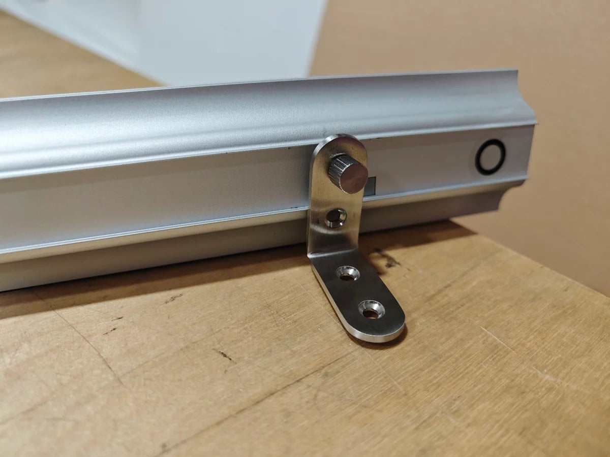 Wall-mounted Pop-up Lightbox mounting bracket on the profile