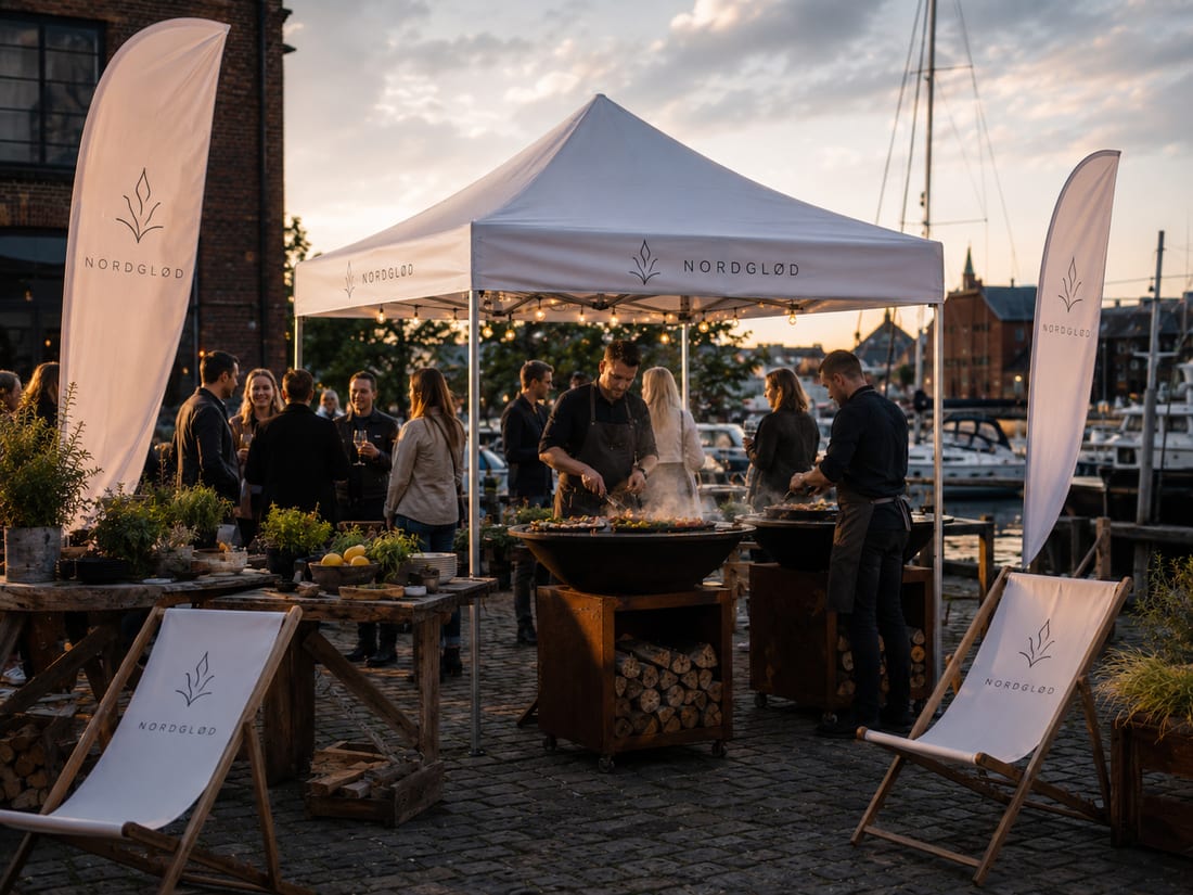 Illustrative concept: pale Feather flags framing an evening hospitality event